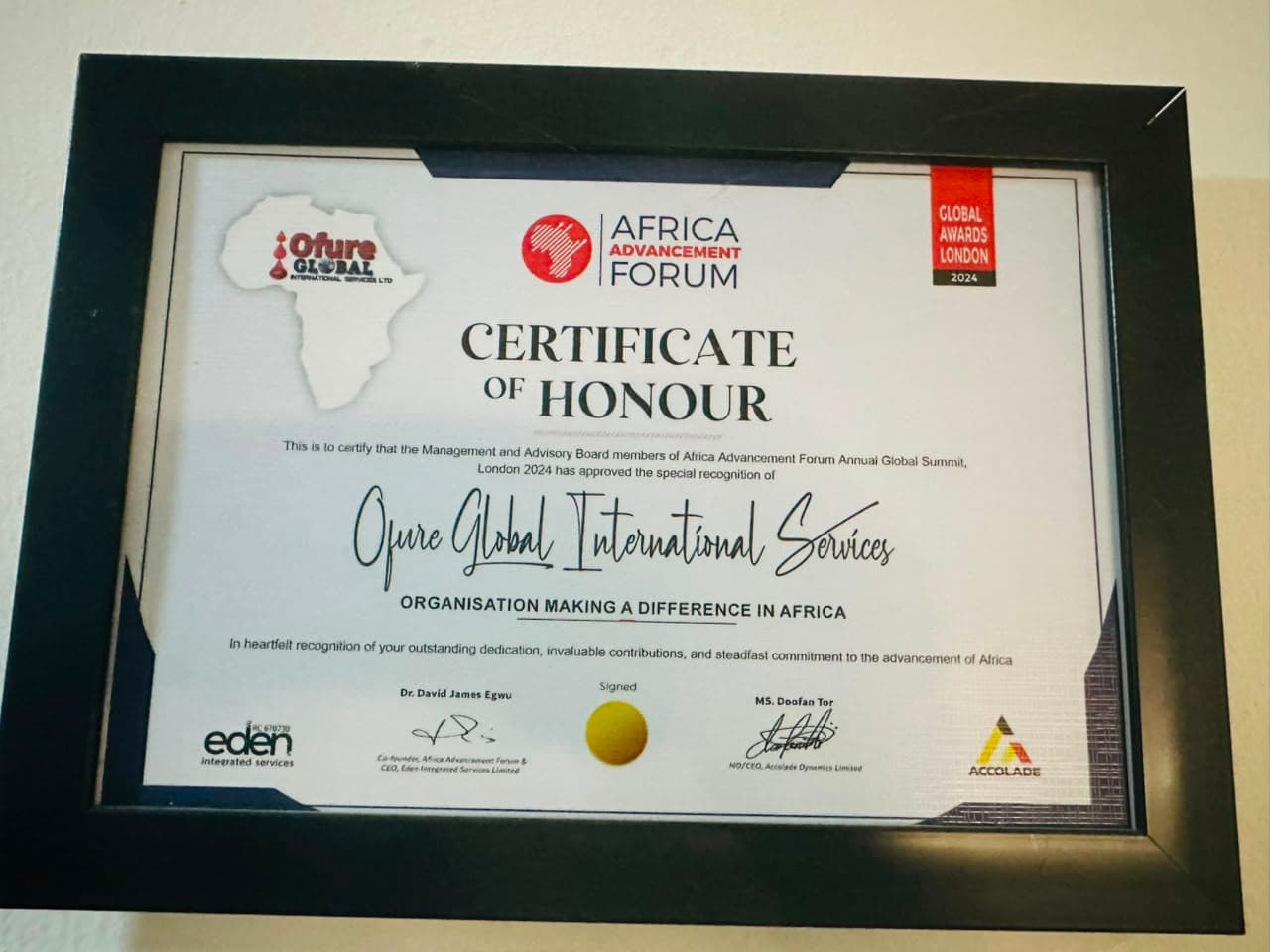 Framed Africa Advancement Forum Certificate of Honour presented to Ofure Global International Services (OGIS)