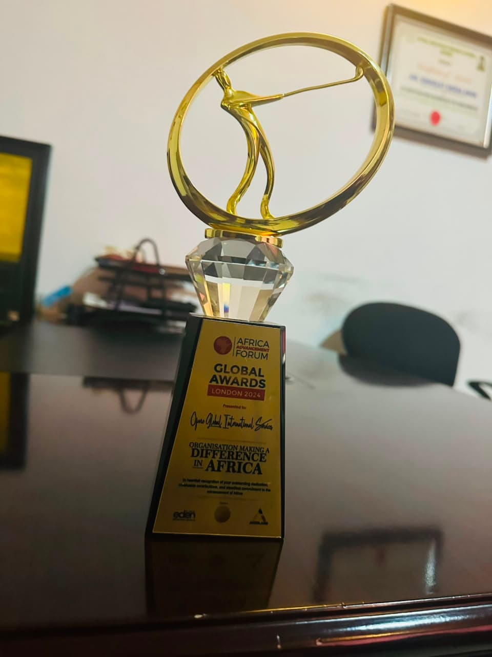 Africa Advancement Forum Global Awards London trophy presented to Ofure Global International Services (OGIS)